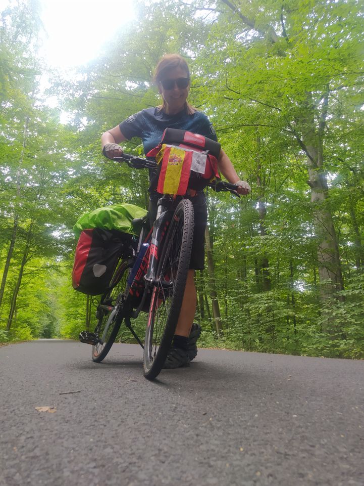 Silvia J. Gonzales proudly sporting a Spanish flag along EuroVelo 7 - Sun Route, just north of Berlin.