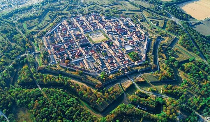 An aerial photograph of the town of Neuf-Brisach showing the star-shaped layout of the town