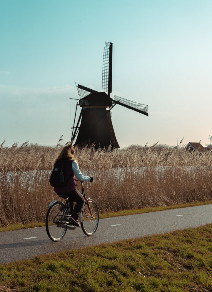 Cycling across the unique Kinderdijk, Netherlands