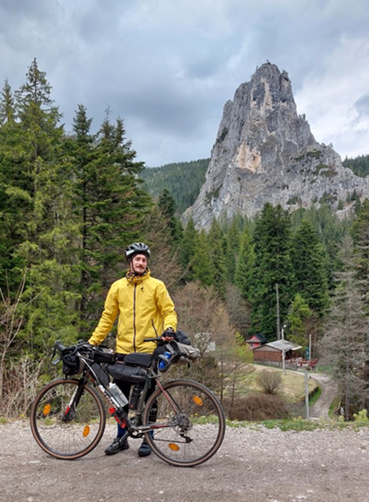 Right before reaching home, I discovered the beauty of riding in the mountains. This was a first for me and I am happy I did it across the Carpathians. Can you tell how happy (and exhausted) I am? © Paul Anton