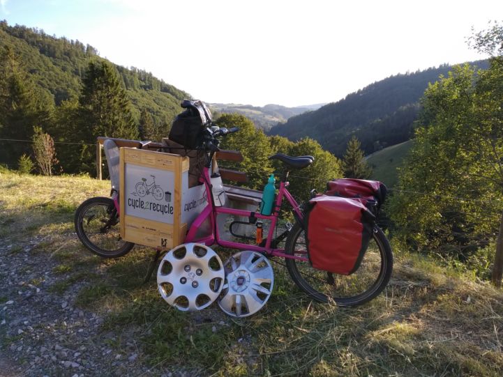 Cycling in the Black Forest with several big car parts.jpg