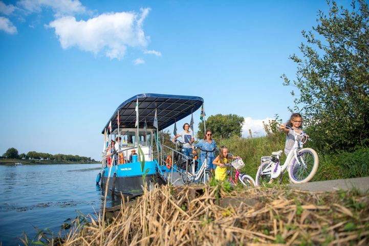 Take the ferry to cross the Meuse River